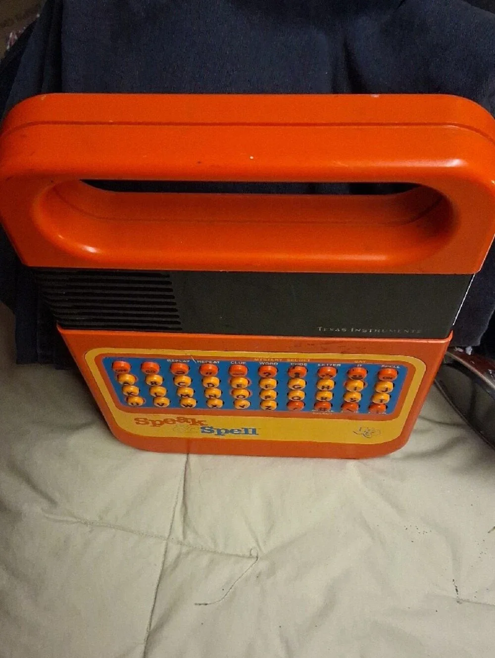 Texas Instruments Orange and Yellow Speak & Spell Handheld Learning Console